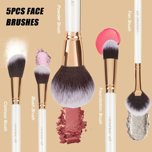 Set of five makeup brushes including powder, fan, foundation, blush, and contour brushes.