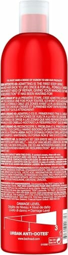 Back label of a red bottle with text detailing product information.